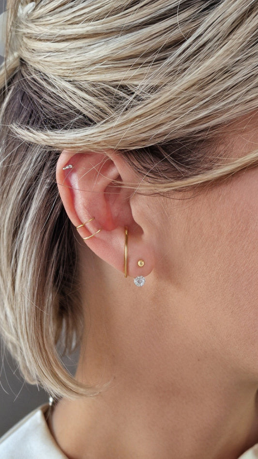 Stones and balls piercing goud
