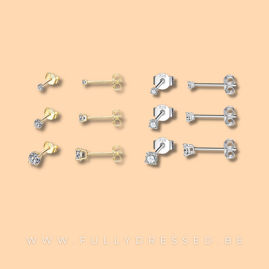 Wit steentje goud en zilver steker