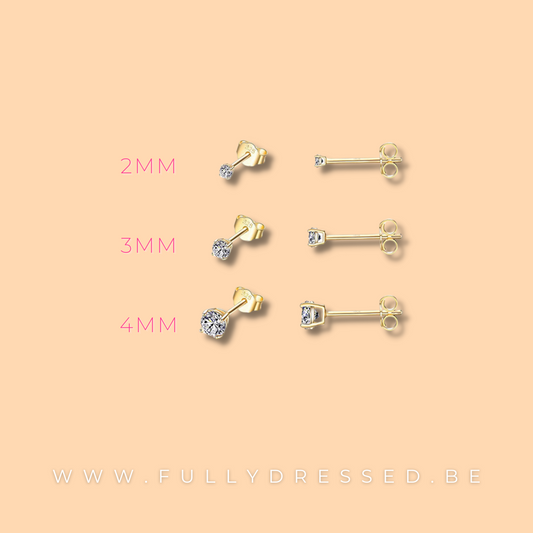 Wit steentje goud en zilver steker