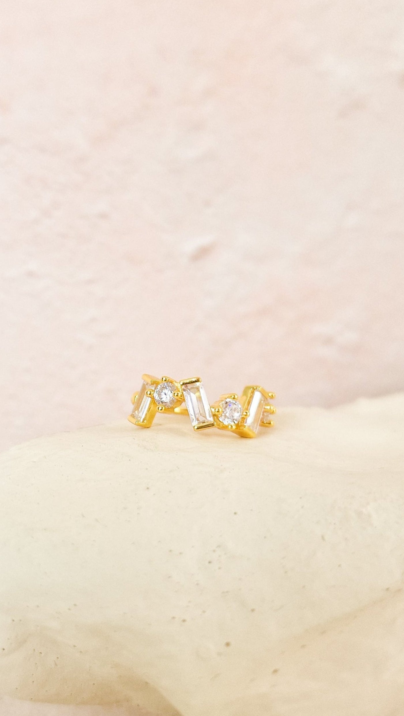 Growing white ear cuff