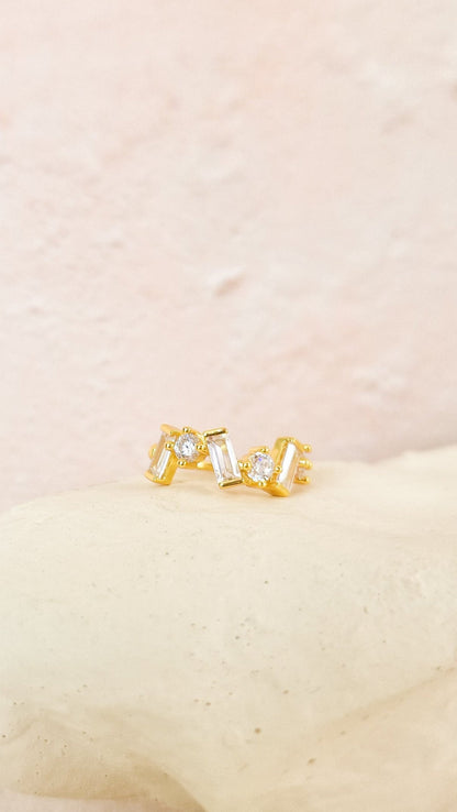 Growing white ear cuff