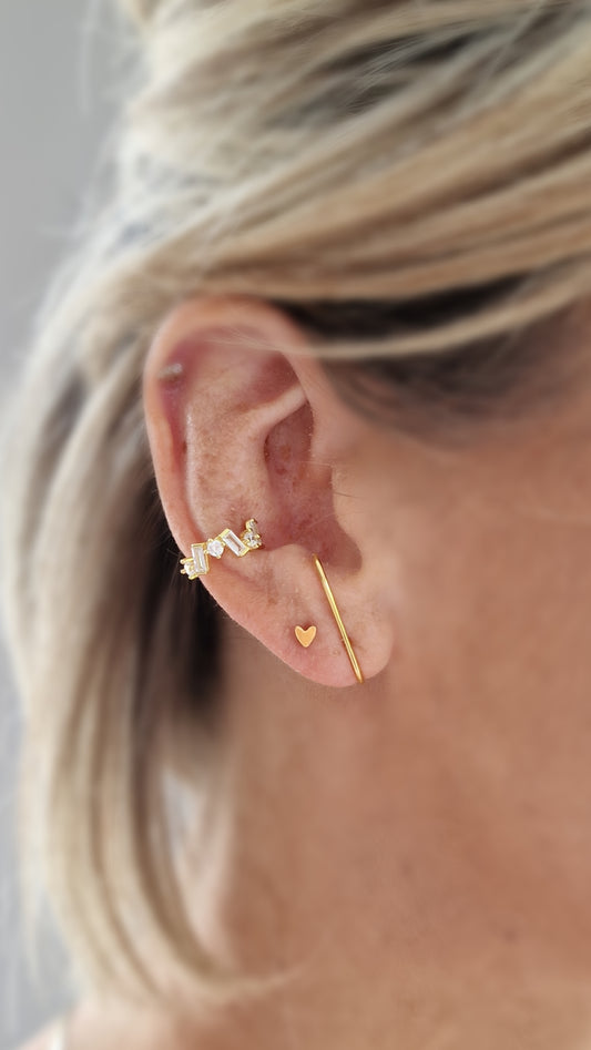 Growing white ear cuff